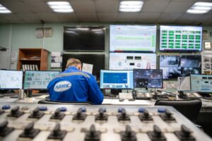 Engineer monitoring multiple screens in a control room, a metaphor for human-in-the-loop AI agent UX